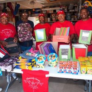 Champaign group again prepares to help kids be ready to go to school by donating items